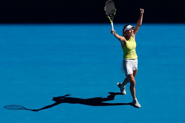 Caroline Wozniacki shows fighting spirit to advance to third round