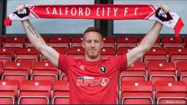 Gary Neville defends Salford after Adam Rooney signing