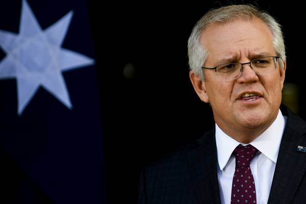 Australian PM apologises for slow Covid vaccine rollout as cases rise