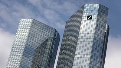 Deutsche Bank restructures business, removes top executives