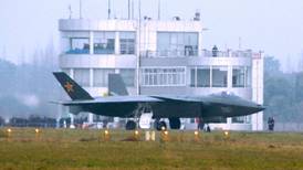 China unveils stealth jet    as navy assembles ‘first class’ fleet