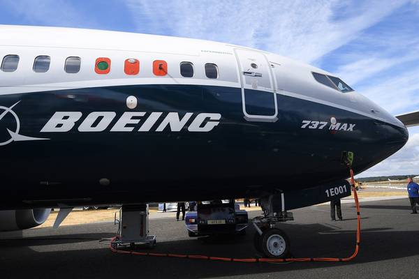 Boeing posts first annual loss since 1997 as Max costs skyrocket