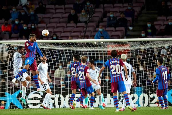Barcelona scrape Granada draw as fans stay away from Nou Camp