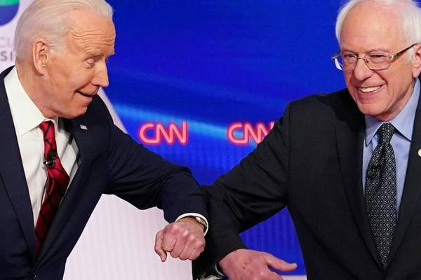 Democratic hopefuls bump elbows and lock horns at first one-on-one debate