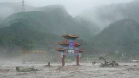 Beijing battered by heaviest rain in 140 years as China denies obstructing climate discussions