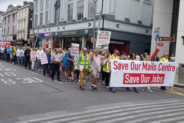 An Post workers protest in Cork as mail centre faces closure