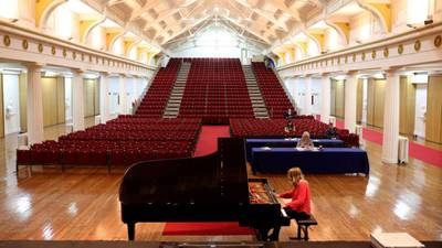 Comparing notes at the Dublin International Piano competition