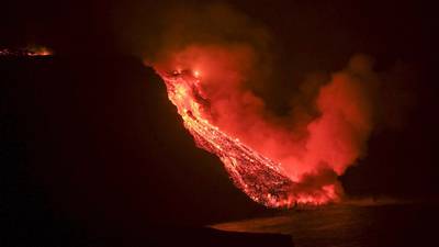Locals on Spanish island take cover as lava releases toxic gases