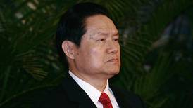 China steps up investigation into former security chief
