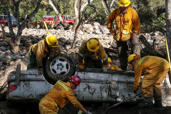 California mudslide: Death toll rises to 19 as search for survivors continues