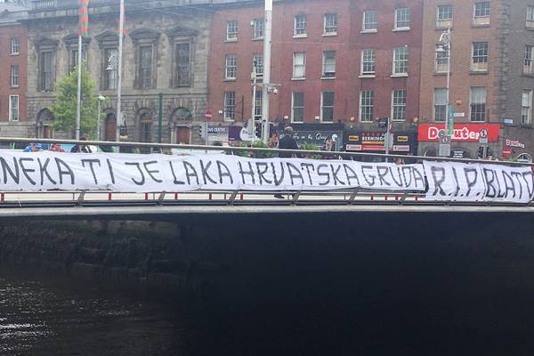 Banner on Dublin bridge pays tribute to deceased soccer fan