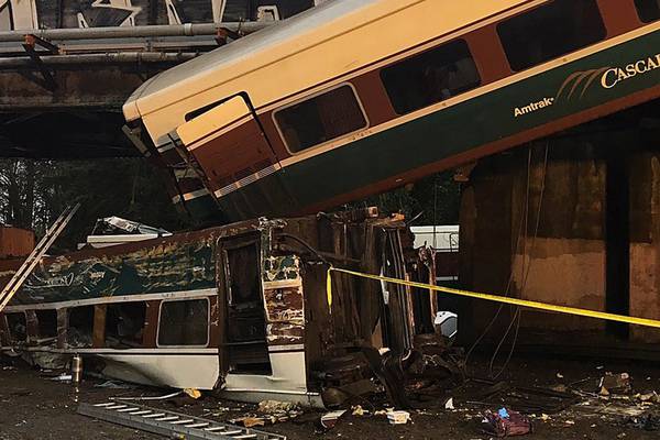 At least six dead as train derails onto Washington highway