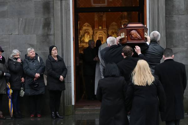 Thousands file past open coffin of Dolores O’Riordan in her native Limerick