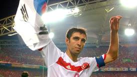 Turkey issues warrant for former football star over coup