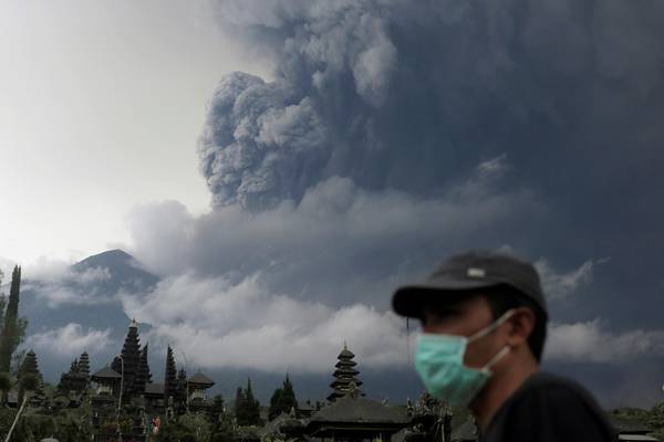 Bali’s erupting volcano raises air travel warnings