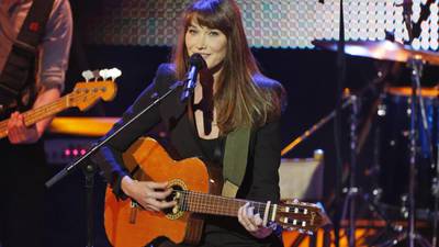 Carla Bruni turns the knife as she lets her music speak for herself