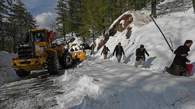 Roads cleared at Pakistan resort after snowstorm kills 22 people stuck in vehicles