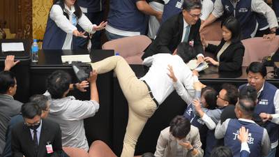Taiwan's parliament comes to blows as lawmakers tussle over reforms