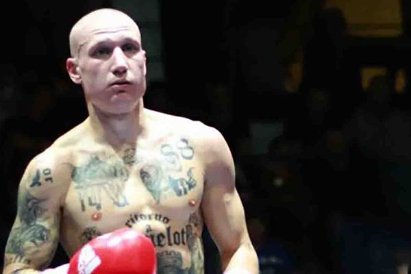 Boxer sparks row in Italy over neo-Nazi tattoos