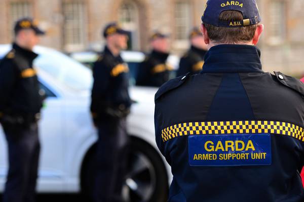 Man in court after robbing shop while armed gardaí present