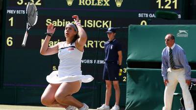 Bartoli claims first Grand Slam title at Wimbledon