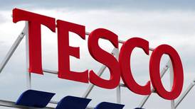 Tesco first-half profits slump 24 per cent