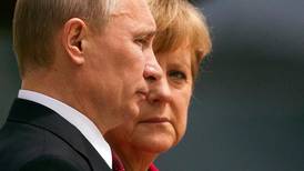 Merkel becomes diplomatic link between Russia rattling its chains and US threatening sanctions