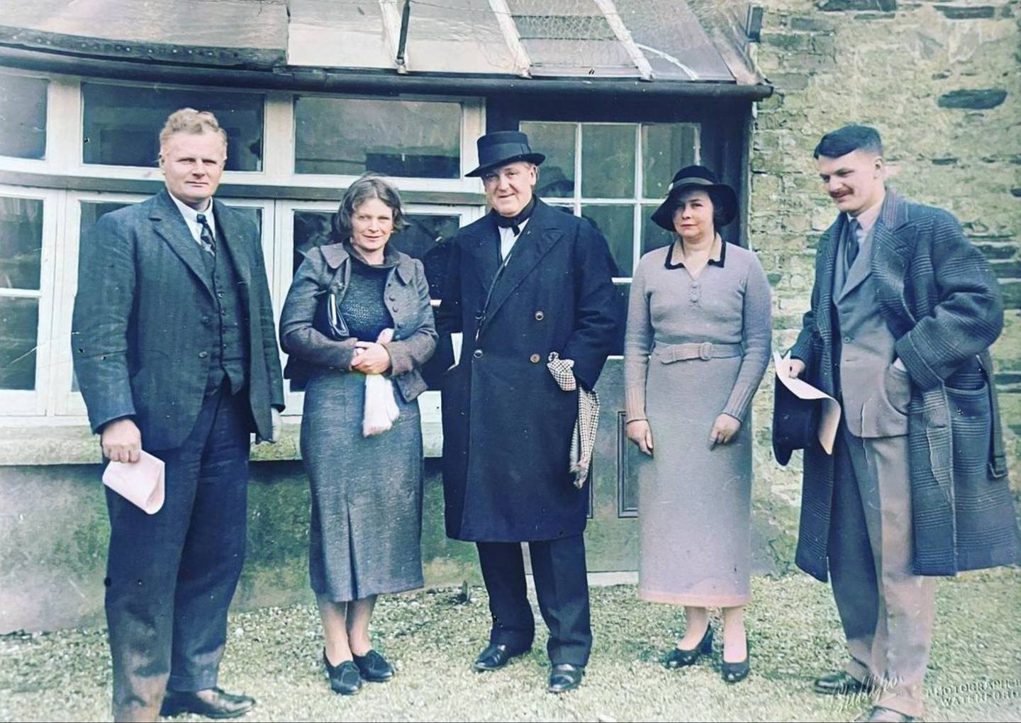 Paul Henry (centre) at the official opening of the Newtown School Art Exhibition, 1937, with Arnold Marsh, Hilda Roberts, Joan Chambers and Robert Burke.  Photograph: Supplied by Lilliput Press