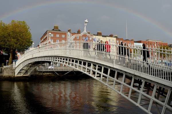 Racist graffiti on Ha’penny Bridge and Temple Bar shop front removed by council