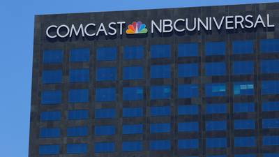 Comcast opens Disney bidding war with $65bn Fox offer