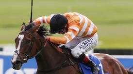 Pat Smullen partners Covert Love to Irish Oaks victory