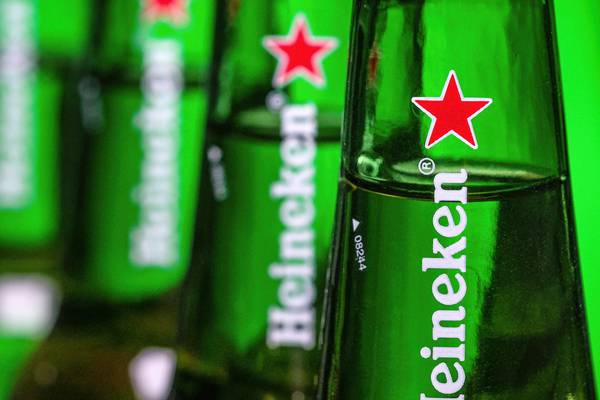 Heineken buys into China’s biggest beer company
