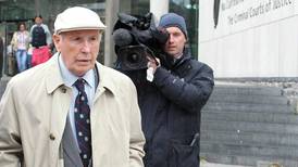 Retired consultant Michael Shine brings case to stop trial