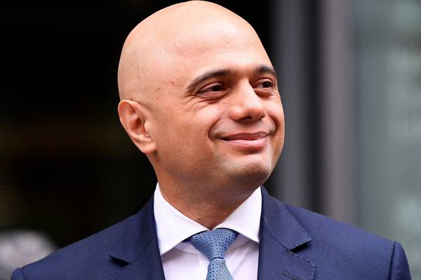 New home secretary shifts May government toward harder Brexit