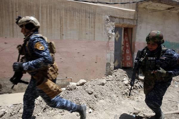 Iraqi forces storm Islamic State-held Old City of Mosul