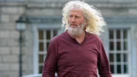 Mick Wallace says arms industry shares up   4% in  three days