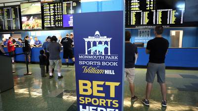 William Hill profit hit by regulatory cap and US expansion costs