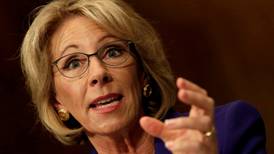 VP breaks Senate tie to confirm DeVos as US education secretary