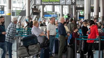 Dublin airport queues, new Doyle hotel chief, and workers pay restraint