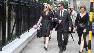 Madonna attends Dublin funeral of architect David Collins