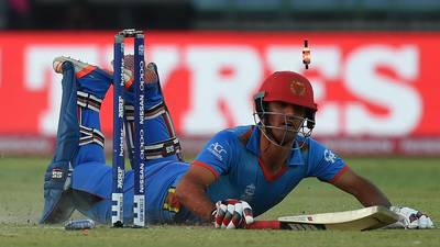 England survive scare to see off game Afghanistan
