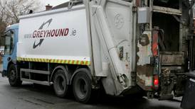 Man sleeping in bin narrowly escapes being crushed in  truck
