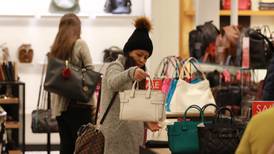 Handbags at dawn:   Sales draw the dazed and determined