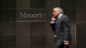 Bank shares advance  after  upgrades by Moody’s
