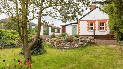 Enchanting cottage with rolling gardens in Sutton for €495k