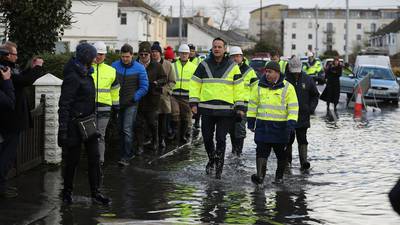 Snow and ice warning issued as communities battle floods