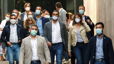 Spaniards vote in regional elections under coronavirus cloud