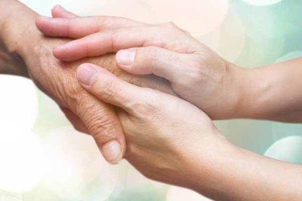 Unpaid carers should receive ‘participation income’, NESC says