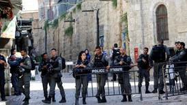 Two Israeli policemen and three attackers shot dead near Jerusalem holy site