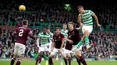 Celtic hammer Hearts to close gap at the top to a single point